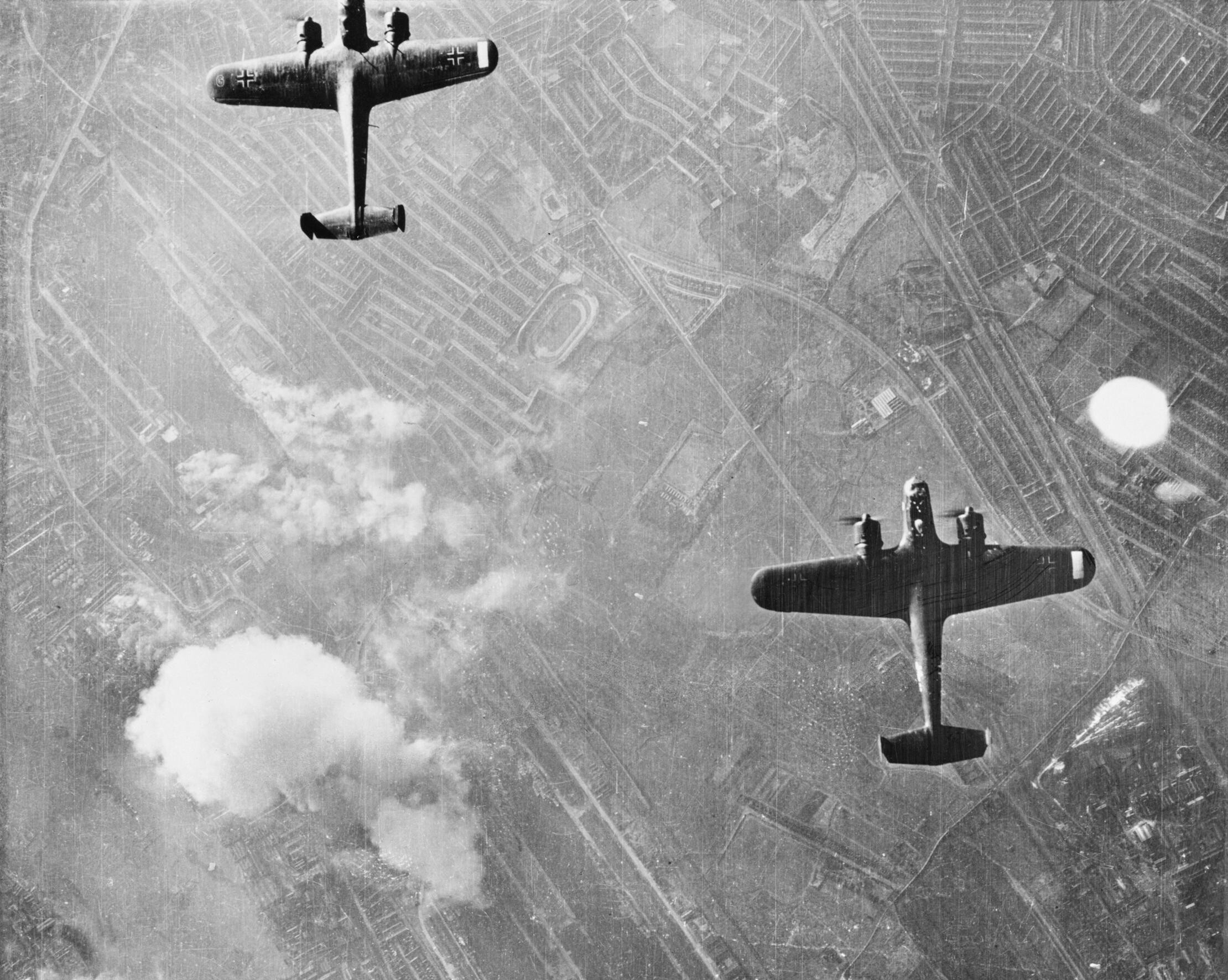 Dornier Do 17 bombers above fires near Beckton gas works, West Ham, on 7 September 1940.