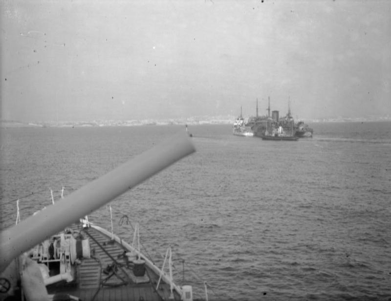 The damaged tanker Ohio, supported by destroyers, moves toward Grand Harbour on 15 August 1942.