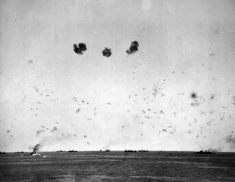 The Malta-bound Operation Pedestal convoy under air attack on 11 August 1942, with HMS Rodney at left and HMS Manchester at right.